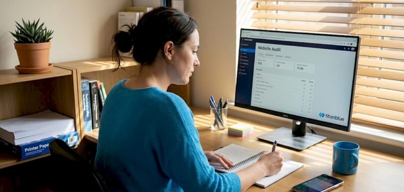 Business owner reviewing website optimisation checklist