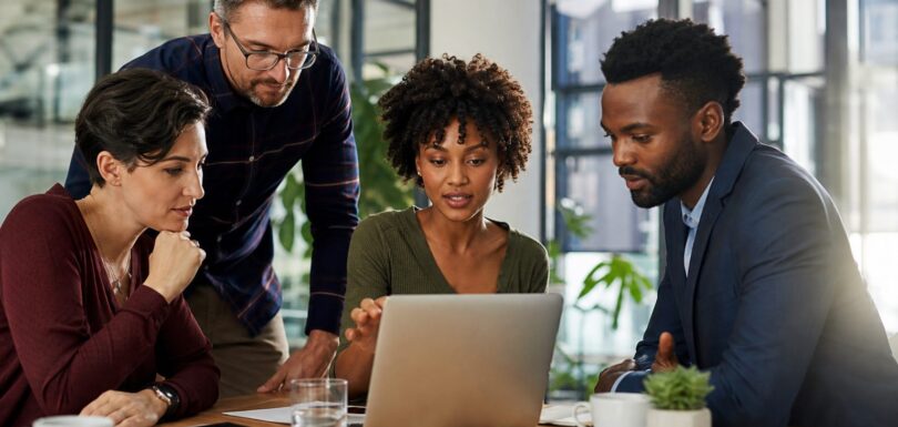 Business team reviewing website analytics in a modern office