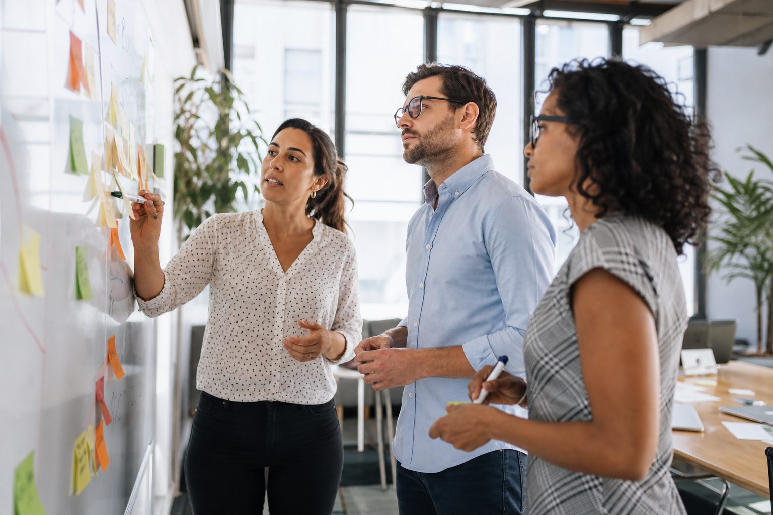 Professional team collaborating on AI SEO strategy in a modern meeting room
