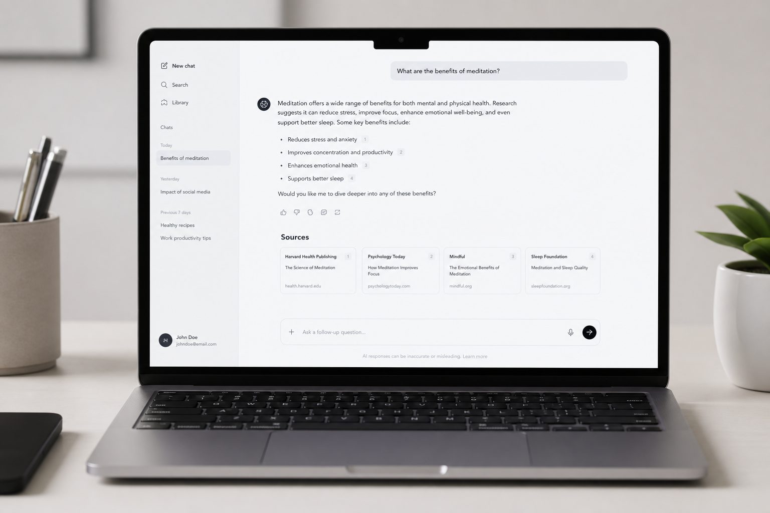 Laptop screen displaying AI chatbot search interface showing GEO citations and results