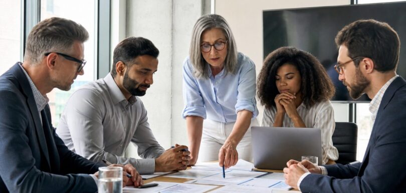 Business team reviewing GEO strategy and AI search analytics