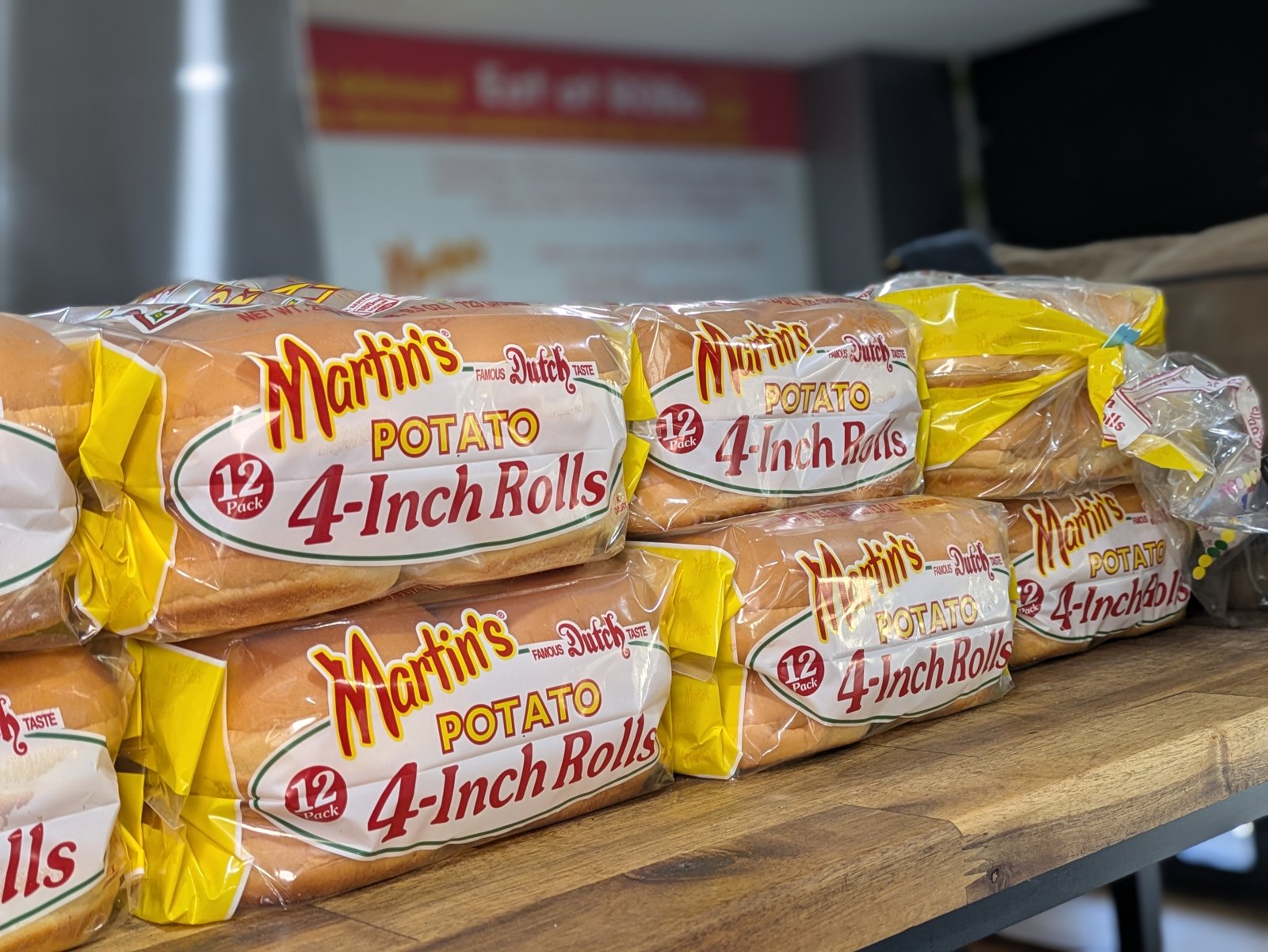 Martin's potato rolls stacked in the Eat at ROBs kitchen