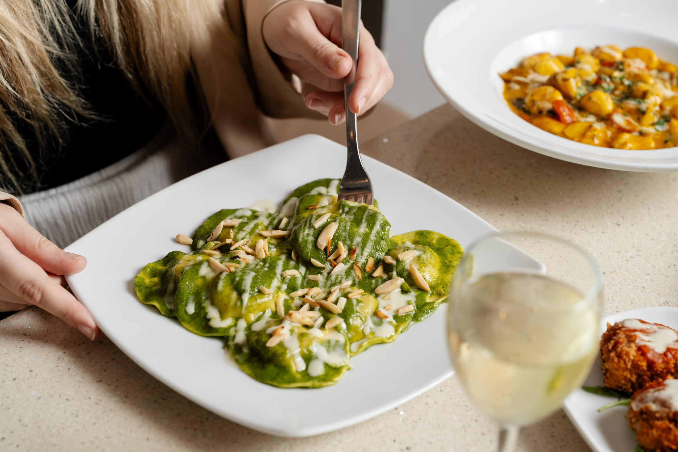 Wood-fired chicken and pesto pizza at Mad Over Italian