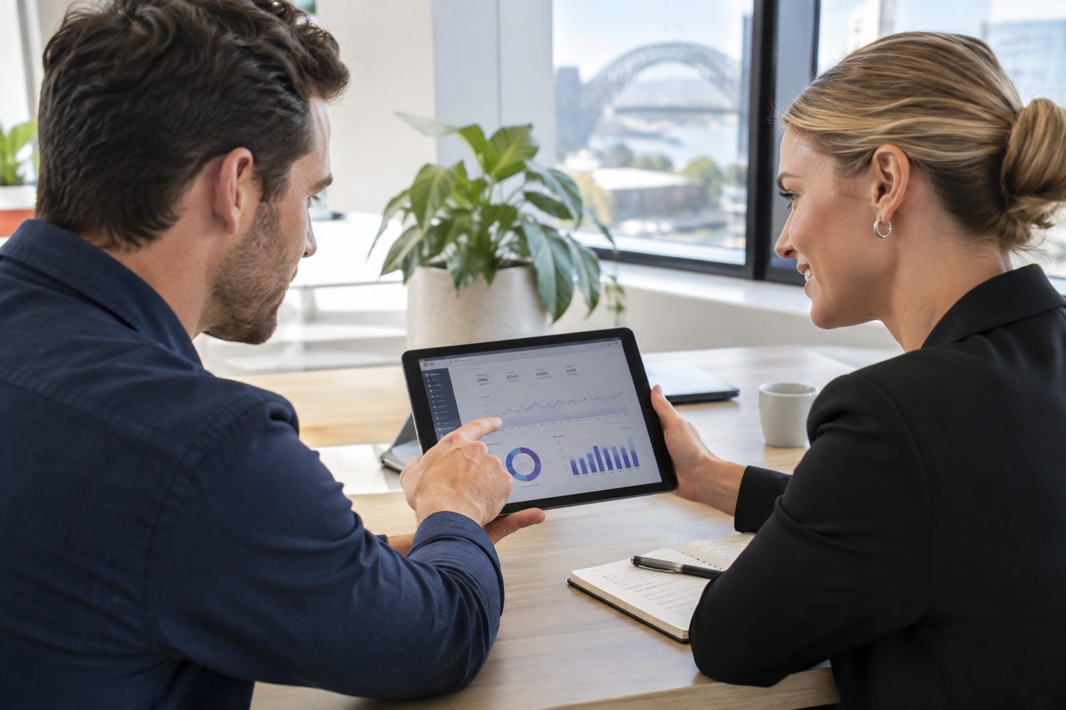 Business colleagues reviewing ecommerce sales analytics dashboard